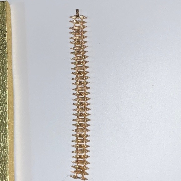 Avon 1972 Starflower Textured Sculptural Modernist Gold Toned Metal Bracelet - Picture 2 of 11